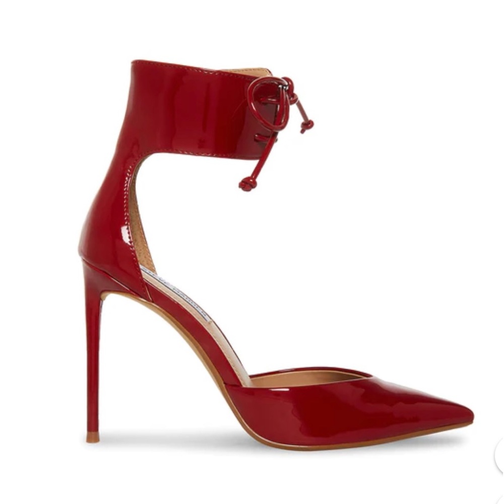 Patent red ankle strap/cuff heels.